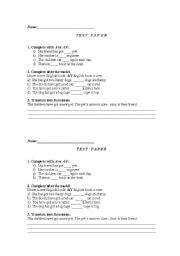 English worksheet: test parer/work sheet on possessives and article