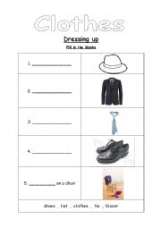 English Worksheet: Clothes - Dressing up