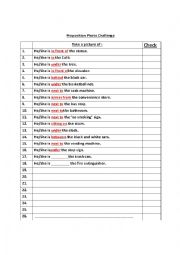 English Worksheet: Preposition of place photo hunt