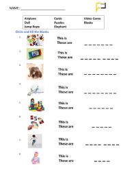 English Worksheet: Circle and Fil the Blanks (Toys)