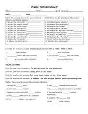 English Worksheet: TEST family members and demostratives pronouns